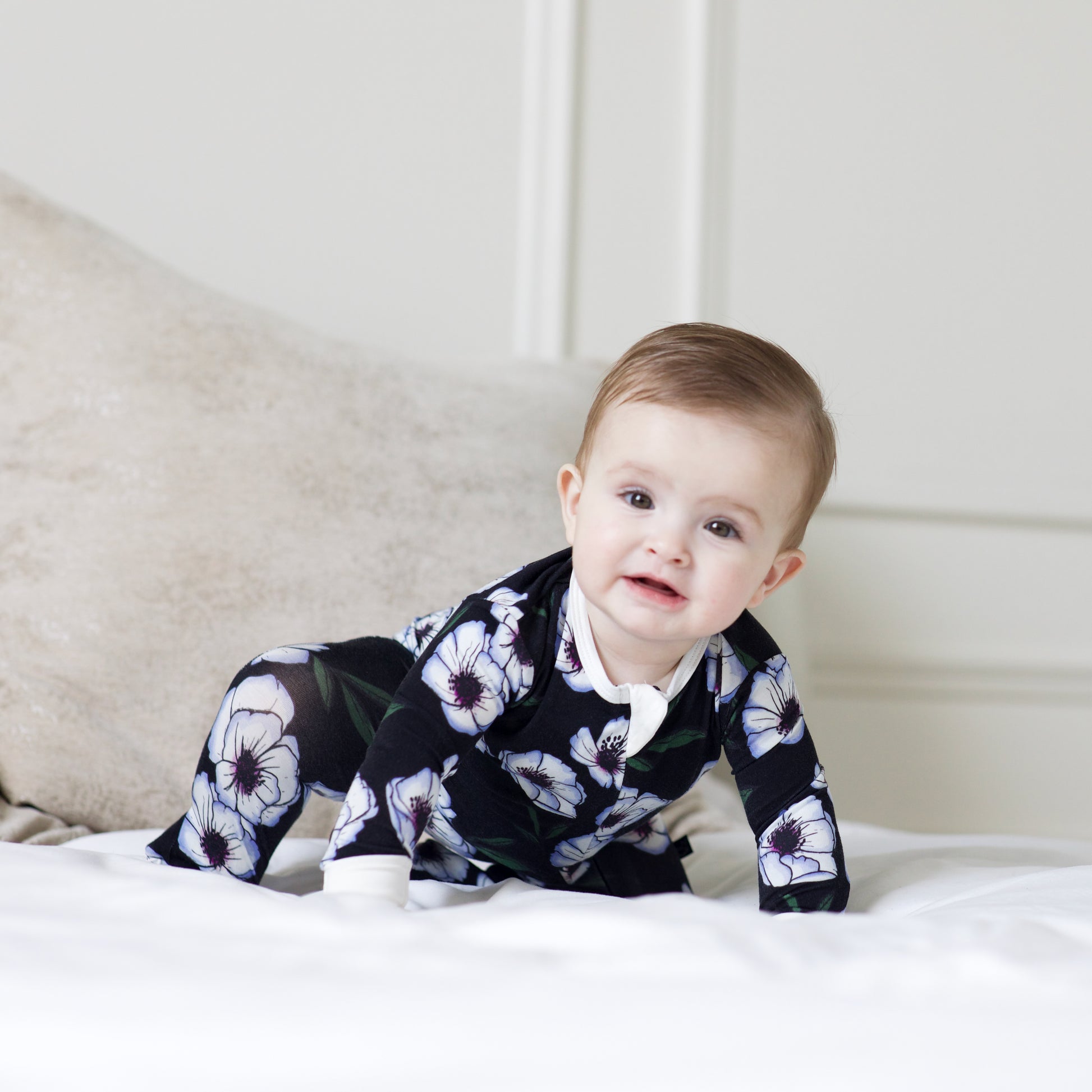 Violet Magnolia Bamboo Footed Sleeper - Peregrine Kidswear - Footed Sleepers - 0-3M shown on a crawling baby